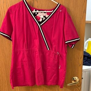 Koi Pink Wrap Top with Black and White Accents